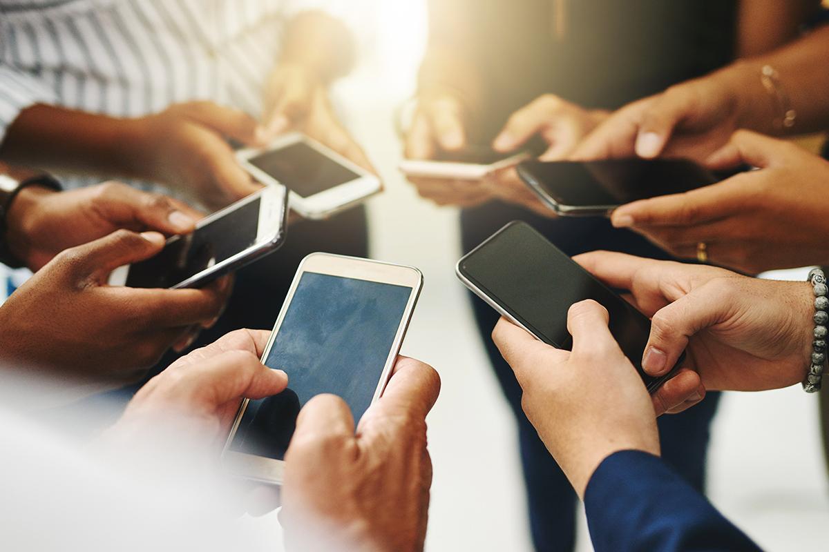 Group of people all on their phones