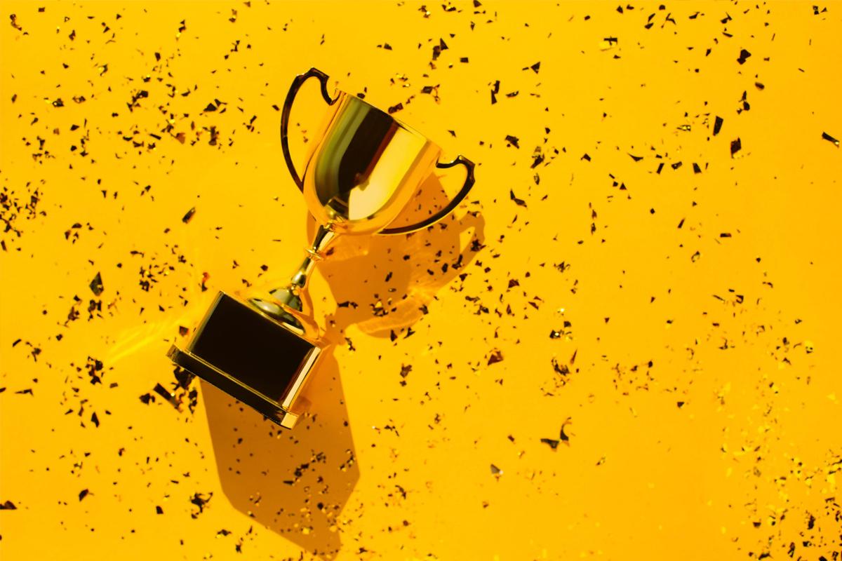 Trophy laying on confetti
