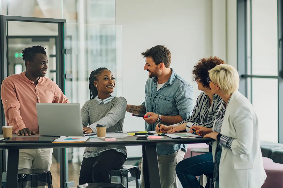 Group of young coworkers talking