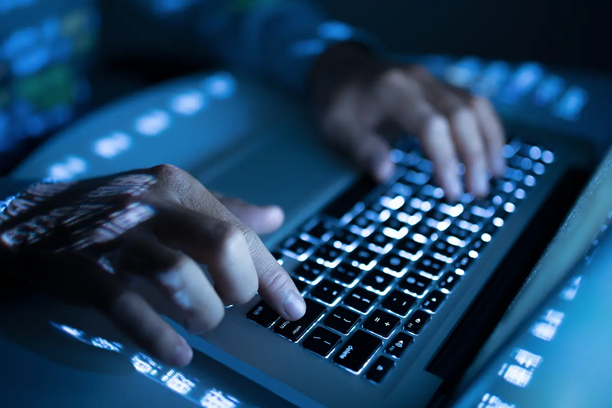 On a computer in a dark setting